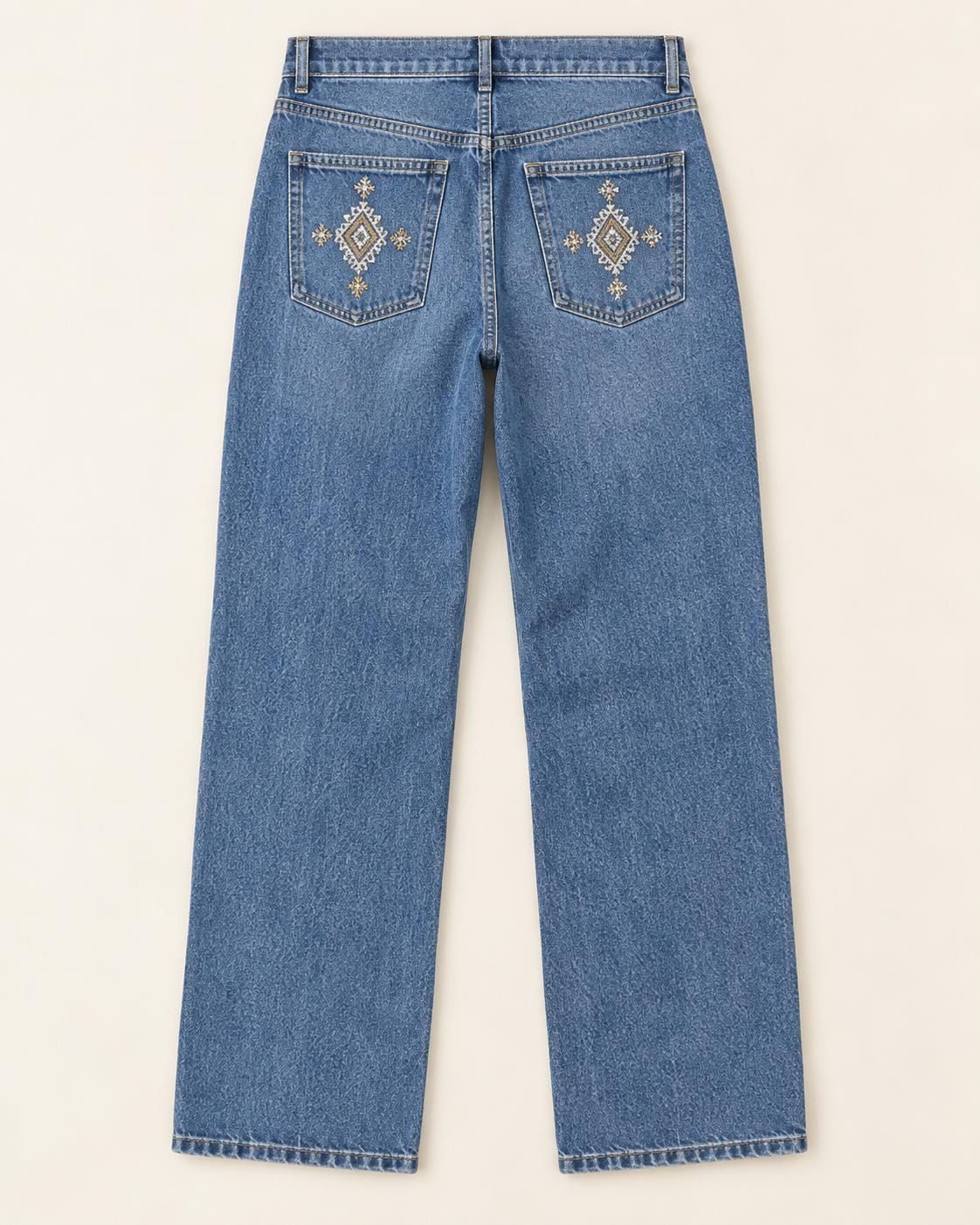 Women's embroidered denim jeans, geometric back pocket design reference