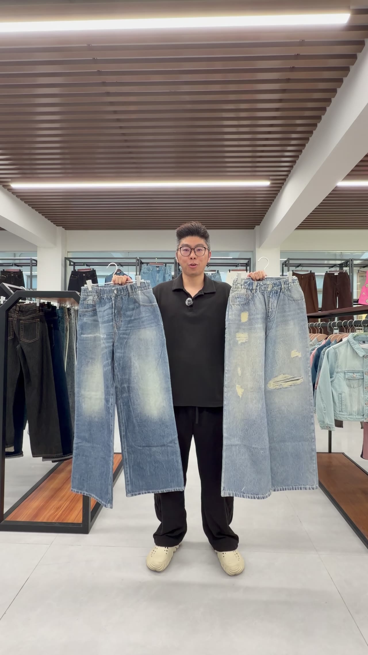 Two denim-look garment samples displayed side by side